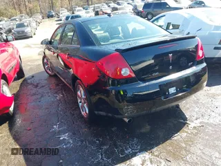 2005 Pontiac G6 GT with VIN 1G2ZH548154165427, listed as a IAAI auction lot 41650622 with 149,187 mi miles. Bid and sale history available at carsss.com. Image 3.