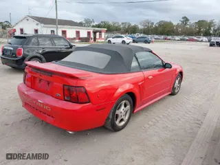 2003 Ford Mustang Deluxe with VIN 1FAFP44433F362647, listed as a IAAI auction lot 41062105 with 168,030 mi miles. Bid and sale history available at carsss.com. Image 4.