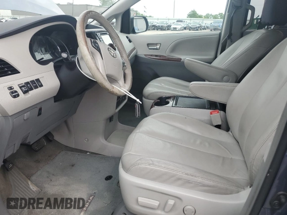 2014 Toyota Sienna XLE with VIN 5TDYK3DC2ES520840, listed as a Copart auction lot 59672295 with 194,143 mi miles and Salvage title. Bid and sale history available at DreamBid. Image 7.