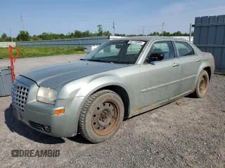 2006 Chrysler 300 Touring z VIN 2C3LA53G86H468423, wystawiony jako Copart lot #60735895 z przebiegiem 344 961 mil mil oraz Czysty tytuł • Clean title. Historia ofert i sprzedaży dostępna na DreamBid. Obrazek 1.