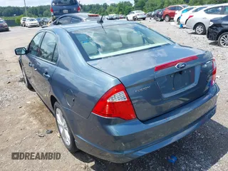 2012 Ford Fusion SE with VIN 3FAHP0HAXCR190170, listed as a IAAI auction lot 42641299 with 180,760 mi miles and . Bid and sale history available at DreamBid. Image 3.