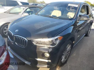 2018 BMW X1 xDrive28i with VIN WBXHT3C37J5K27694, listed as a Copart auction lot 64022772 with 59,413 mi miles. Bid and sale history available at carsss.com. Image 2.