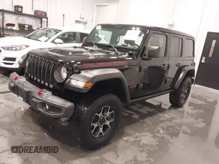 2019 Jeep Wrangler Unlimited Rubicon z VIN 1C4HJXFN7KW561193, wystawiony jako IAAI lot #41500907 z przebiegiem 18 697 mil mil oraz . Historia ofert i sprzedaży dostępna na DreamBid. Obrazek 18.