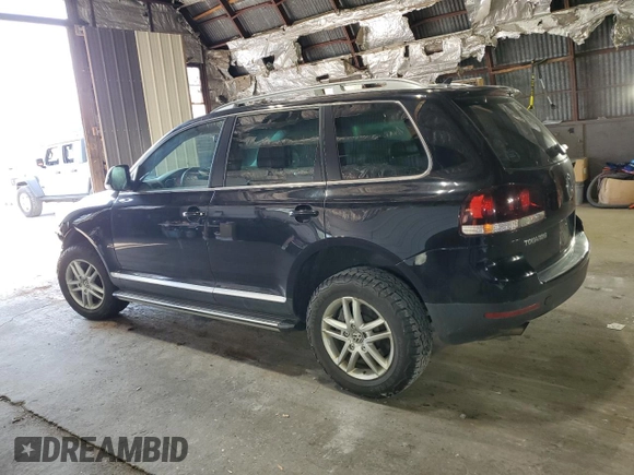 2010 Volkswagen Touareg VR6 with VIN WVGBF7A99AD002591, listed as a Copart auction lot 70624234 with 154,330 mi miles and Salvage Title. Bid and sale history available at DreamBid. Image 2.