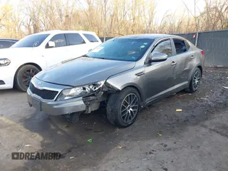 2013 Kia Optima LX with VIN 5XXGM4A77DG166140, listed as a IAAI auction lot 41881144 with 185,391 mi miles. Bid and sale history available at carsss.com. Image 2.