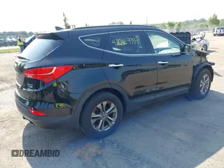 2014 Hyundai Santa Fe with VIN 5XYZUDLB9EG187420, listed as a IAAI auction lot 42369989 with 181,713 mi miles and . Bid and sale history available at DreamBid. Image 4.