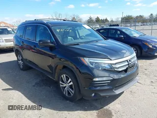 2016 Honda Pilot EX-L with VIN 5FNYF5H57GB023852, listed as a IAAI auction lot 41811412 with 151,707 mi miles and . Bid and sale history available at carsss.com. Image 1.