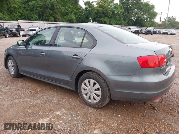 2014 Volkswagen Jetta S z VIN 3VW2K7AJ2EM313510, wystawiony jako IAAI lot #42334212 z przebiegiem 180 245 mil mil oraz . Historia ofert i sprzedaży dostępna na DreamBid. Obrazek 3.