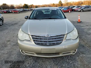 2010 Chrysler Sebring Touring z VIN 1C3CC4FBXAN119459, wystawiony jako Copart lot #47165515 z przebiegiem 125 382 mil mil oraz Szkoda całkowita • Salvage title. Historia ofert i sprzedaży dostępna na DreamBid. Obrazek 5.