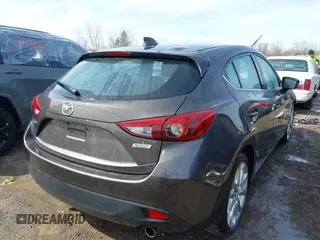 2014 Mazda 3 S Grand Touring with VIN JM1BM1M39E1149581, listed as a IAAI auction lot 41813917 with 143,019 mi miles and . Bid and sale history available at DreamBid. Image 4.