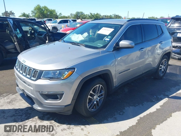 2019 Jeep Compass Altitude with VIN 3C4NJCBB1KT819754, listed as a IAAI auction lot 42083019 with 79,949 mi miles and . Bid and sale history available at DreamBid. Image 18.