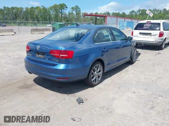 2015 Volkswagen Jetta Sport with VIN 3VWD17AJ9FM297822, listed as a IAAI auction lot 42621800 with 99,966 mi miles and . Bid and sale history available at DreamBid. Image 4.