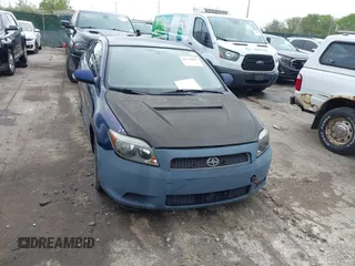 2005 Scion tC with VIN JTKDE177750051166, listed as a IAAI auction lot 42178097 with 205,231 mi miles. Bid and sale history available at carsss.com. Image 6.