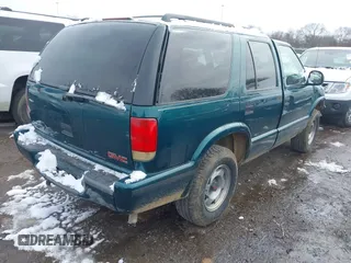1998 GMC Jimmy SL with VIN 1GKCS13W4W2562613, listed as a IAAI auction lot 41610601 with 1 mi miles. Bid and sale history available at carsss.com. Image 4.