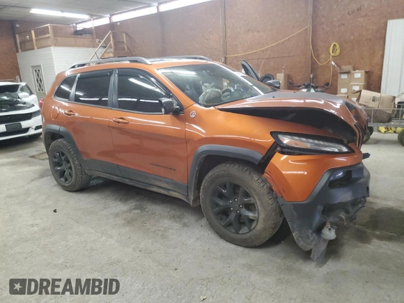 2014 Jeep Cherokee Trailhawk with VIN 1C4PJMBS0EW308775, listed as a Copart auction lot 60465125 with 117,326 mi miles and Salvage title. Bid and sale history available at DreamBid. Image 4.