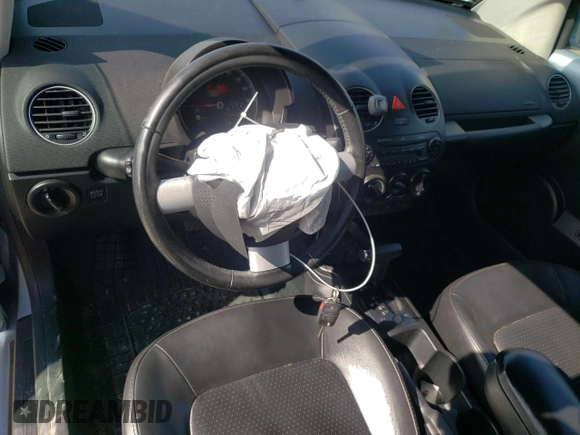 2009 Volkswagen Beetle S with VIN 3VWRF31Y09M402197, listed as a Copart auction lot 43861405 with 59,644 mi miles and Salvage title. Bid and sale history available at DreamBid. Image 8.