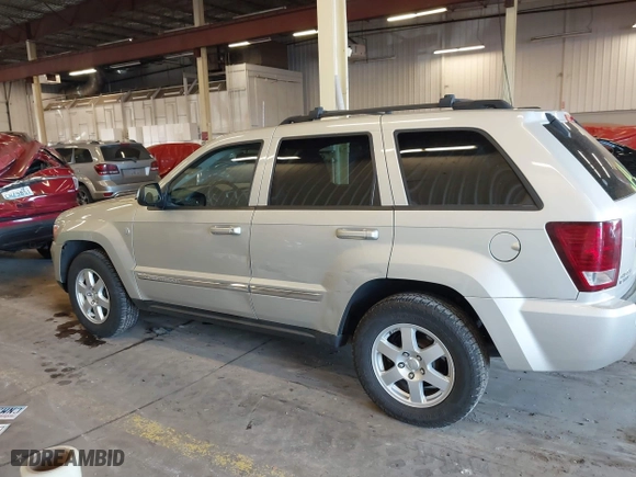 2010 Jeep Grand Cherokee Laredo with VIN 1J4RR4GT9AC106381, listed as a IAAI auction lot 41723268 with 180,008 mi miles. Bid and sale history available at carsss.com. Image 14.