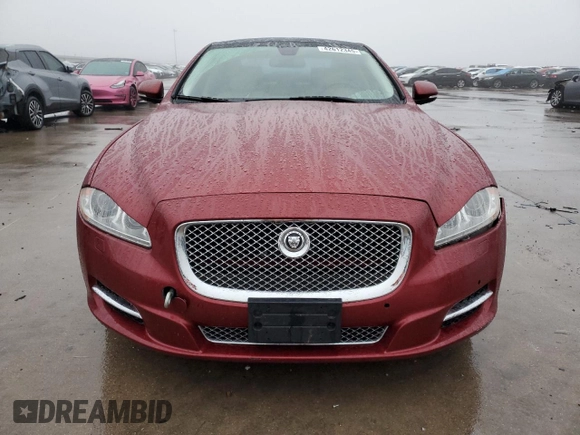 2013 Jaguar XJ Portfolio z VIN SAJWJ2GD0D8V47886, wystawiony jako Copart lot #42612345 z przebiegiem 117 383 mil mil oraz Szkody całkowita. Historia ofert i sprzedaży dostępna na DreamBid. Obrazek 5.