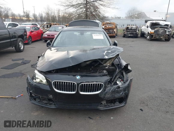 2014 BMW 5 Series 528i with VIN WBA5A5C5XED502261, listed as a IAAI auction lot 41418334 with 139,983 mi miles. Bid and sale history available at carsss.com. Image 12.