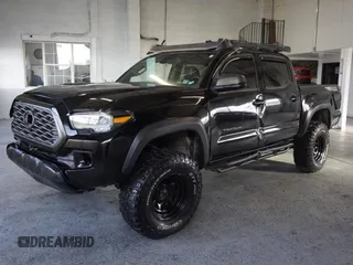 2021 Toyota Tacoma SR z VIN 3TMCZ5AN3MM420851, wystawiony jako Copart lot #55668255 z przebiegiem 61 329 mil mil oraz Szkoda całkowita • Salvage title. Historia ofert i sprzedaży dostępna na DreamBid. Obrazek 2.