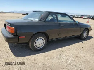 1989 Toyota Celica z VIN JT2ST67C8K7337876, wystawiony jako Copart lot #57918785 z przebiegiem 16 862 mil mil oraz Tytuł czysty. Historia ofert i sprzedaży dostępna na DreamBid. Obrazek 3.