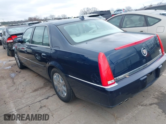 2009 Cadillac DTS 1SA z VIN 1G6KD57Y19U137656, wystawiony jako IAAI lot #41531439 z przebiegiem 103 151 mil mil oraz . Historia ofert i sprzedaży dostępna na DreamBid. Obrazek 3.