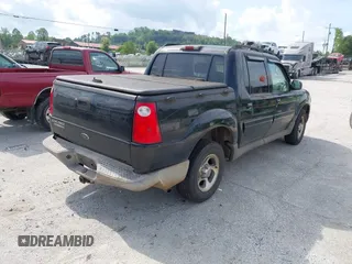 2005 Ford Explorer Sport Trac XLS with VIN 1FMZU67K15UA48446, listed as a IAAI auction lot 42145064 with 220,650 mi miles and . Bid and sale history available at DreamBid. Image 4.
