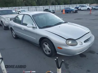 1999 Ford Taurus SE with VIN 1FAFP53U8XG273146, listed as a IAAI auction lot 42831632 with 142,903 mi miles and . Bid and sale history available at DreamBid. Image 1.