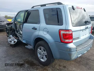 2009 Ford Escape Hybrid with VIN 1FMCU49309KB71172, listed as a IAAI auction lot 40971257 with 118,689 mi miles. Bid and sale history available at carsss.com. Image 3.