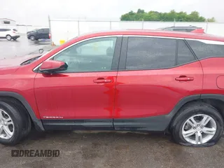2023 GMC Terrain SLE z VIN 3GKALMEG7PL217846, wystawiony jako IAAI lot #42303391 z przebiegiem 14 149 mil mil oraz . Historia ofert i sprzedaży dostępna na DreamBid. Obrazek 14.