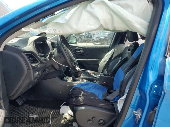 2021 Jeep Cherokee Trailhawk with VIN 1C4PJMBXXMD110436, listed as a Copart auction lot 57829375 with 46,647 mi miles and Salvage title. Bid and sale history available at DreamBid. Image 7.