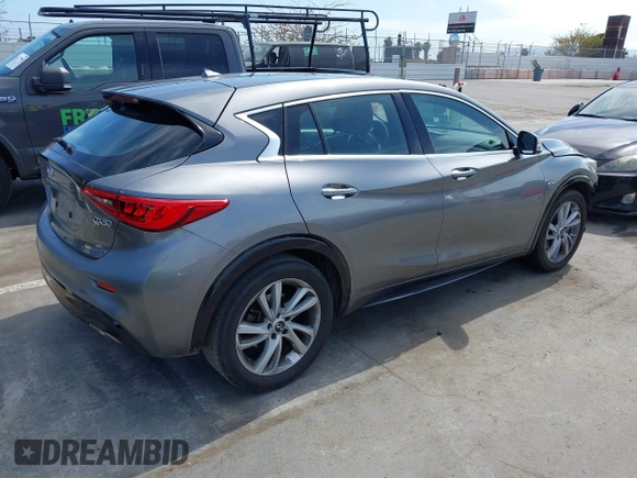 2018 Infiniti QX30 z VIN SJKCH5CP2JA004717, wystawiony jako IAAI lot #42272092 z przebiegiem 129 911 mil mil oraz . Historia ofert i sprzedaży dostępna na DreamBid. Obrazek 4.