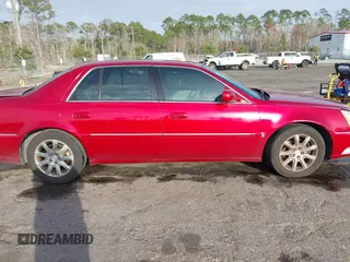 2008 Cadillac DTS 1SA z VIN 1G6KD57Y68U165791, wystawiony jako IAAI lot #41579605 z przebiegiem 94 451 mil mil oraz . Historia ofert i sprzedaży dostępna na DreamBid. Obrazek 13.