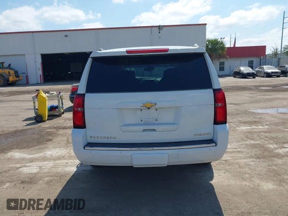 2020 Chevrolet Suburban Premier with VIN 1GNSCJKC9LR125292, listed as a IAAI auction lot 42073858 with 92,363 mi miles and . Bid and sale history available at DreamBid. Image 16.