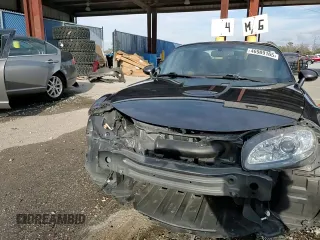 2015 Mazda MX-5 Miata Grand Touring z VIN JM1NC2PF3F0239991, wystawiony jako Copart lot #46989165 z przebiegiem 139 801 mil mil oraz Szkoda całkowita • Salvage title. Historia ofert i sprzedaży dostępna na DreamBid. Obrazek 13.