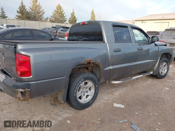 2007 Dodge Dakota SLT z VIN 1D7HW48P57S216313, wystawiony jako IAAI lot #41319321 z przebiegiem 116 712 mil mil oraz . Historia ofert i sprzedaży dostępna na DreamBid. Obrazek 4.