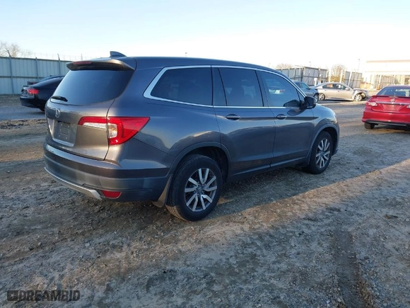 2019 Honda Pilot EX-L with VIN 5FNYF5H5XKB026513, listed as a IAAI auction lot 41269623 with 62,372 mi miles. Bid and sale history available at carsss.com. Image 4.