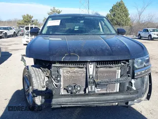 2019 Volkswagen Atlas SEL R-Line z VIN 1V2RR2CA6KC509913, wystawiony jako IAAI lot #41410198 z przebiegiem 97 681 mil mil oraz . Historia ofert i sprzedaży dostępna na DreamBid. Obrazek 12.