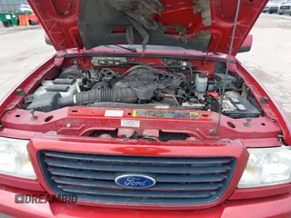 2009 Ford Ranger XLT with VIN 1FTZR45E69PA36126, listed as a IAAI auction lot 41822439 with 160,947 mi miles. Bid and sale history available at carsss.com. Image 10.