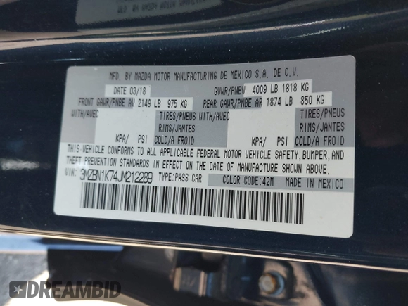 2018 Mazda 3 Sport with VIN 3MZBN1K74JM212289, listed as a IAAI auction lot 42054346 with 56,854 mi miles and . Bid and sale history available at DreamBid. Image 9.
