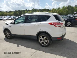 2016 Ford Escape Titanium with VIN 1FMCU9J94GUB31594, listed as a Copart auction lot 51690565 with 119,699 mi miles and Salvage Title. Bid and sale history available at DreamBid. Image 2.