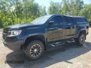 2018 Chevrolet Colorado 4WD ZR2 with VIN 1GCGTEEN6J1262351, listed as a Copart auction lot 63909105 with 220,535 mi miles and Clean title. Bid and sale history available at DreamBid. Image 1.