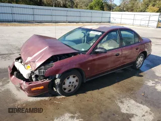 2001 Saturn SL z VIN 1G8ZH54841Z290618, wystawiony jako Copart lot #77850194 z przebiegiem 128 083 mil mil oraz Szkoda całkowita • Salvage title. Historia ofert i sprzedaży dostępna na DreamBid. Obrazek 1.