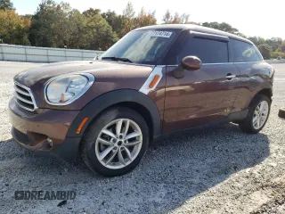 2014 MINI Paceman z VIN WMWSS1C54EWN94478, wystawiony jako Copart lot #77174714 z przebiegiem 119 412 mil mil oraz Szkoda całkowita • Salvage title. Historia ofert i sprzedaży dostępna na DreamBid. Obrazek 1.