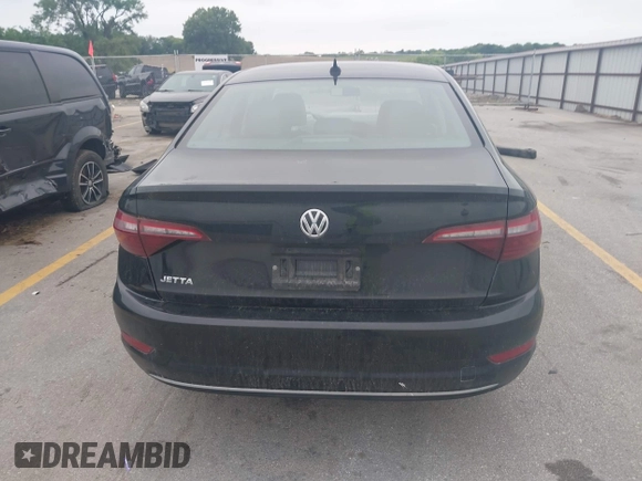 2021 Volkswagen Jetta S z VIN 3VWC57BU5MM008733, wystawiony jako IAAI lot #42527371 z przebiegiem 76 548 mil mil oraz . Historia ofert i sprzedaży dostępna na DreamBid. Obrazek 16.