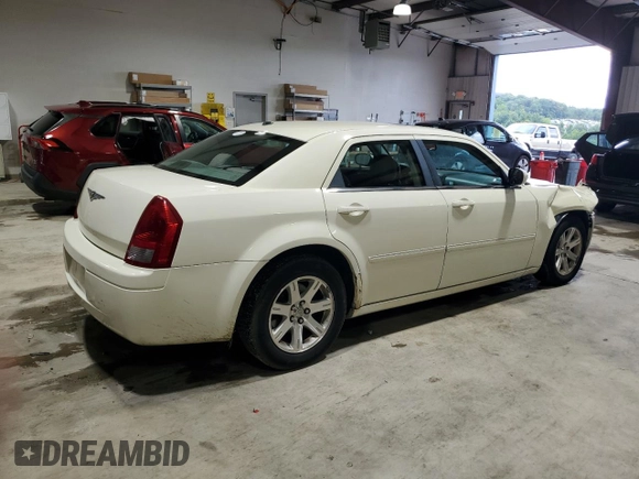 2007 Chrysler 300 with VIN 2C3LA43R37H879385, listed as a Copart auction lot 65837564 with 144,062 mi miles and Salvage Title. Bid and sale history available at carsss.com. Image 3.