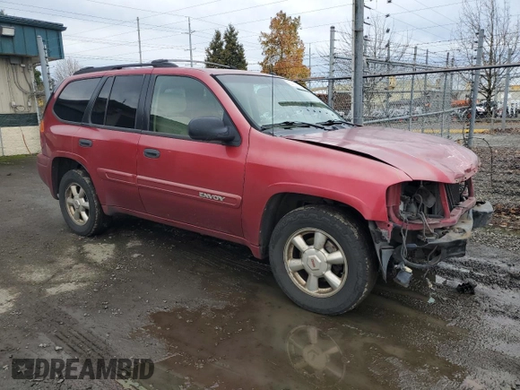 2004 GMC Envoy SLT with VIN 1GKDT13S942237743, listed as a Copart auction lot 85452894 with 192,043 mi miles and Salvage Title. Bid and sale history available at carsss.com. Image 4.