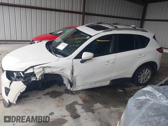 2014 Mazda CX-5 Touring with VIN JM3KE4CY9E0370610, listed as a IAAI auction lot 42016896 with 72,340 mi miles. Bid and sale history available at carsss.com. Image 13.