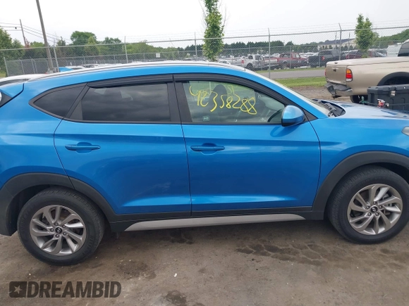 2018 Hyundai Tucson SEL z VIN KM8J3CA4XJU717977, wystawiony jako IAAI lot #42358288 z przebiegiem 121 919 mil mil oraz . Historia ofert i sprzedaży dostępna na DreamBid. Obrazek 14.