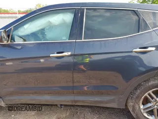 2018 Hyundai Santa Fe 2.4L with VIN 5NMZT3LB2JH092677, listed as a IAAI auction lot 42033763 with 158,039 mi miles and . Bid and sale history available at DreamBid. Image 15.